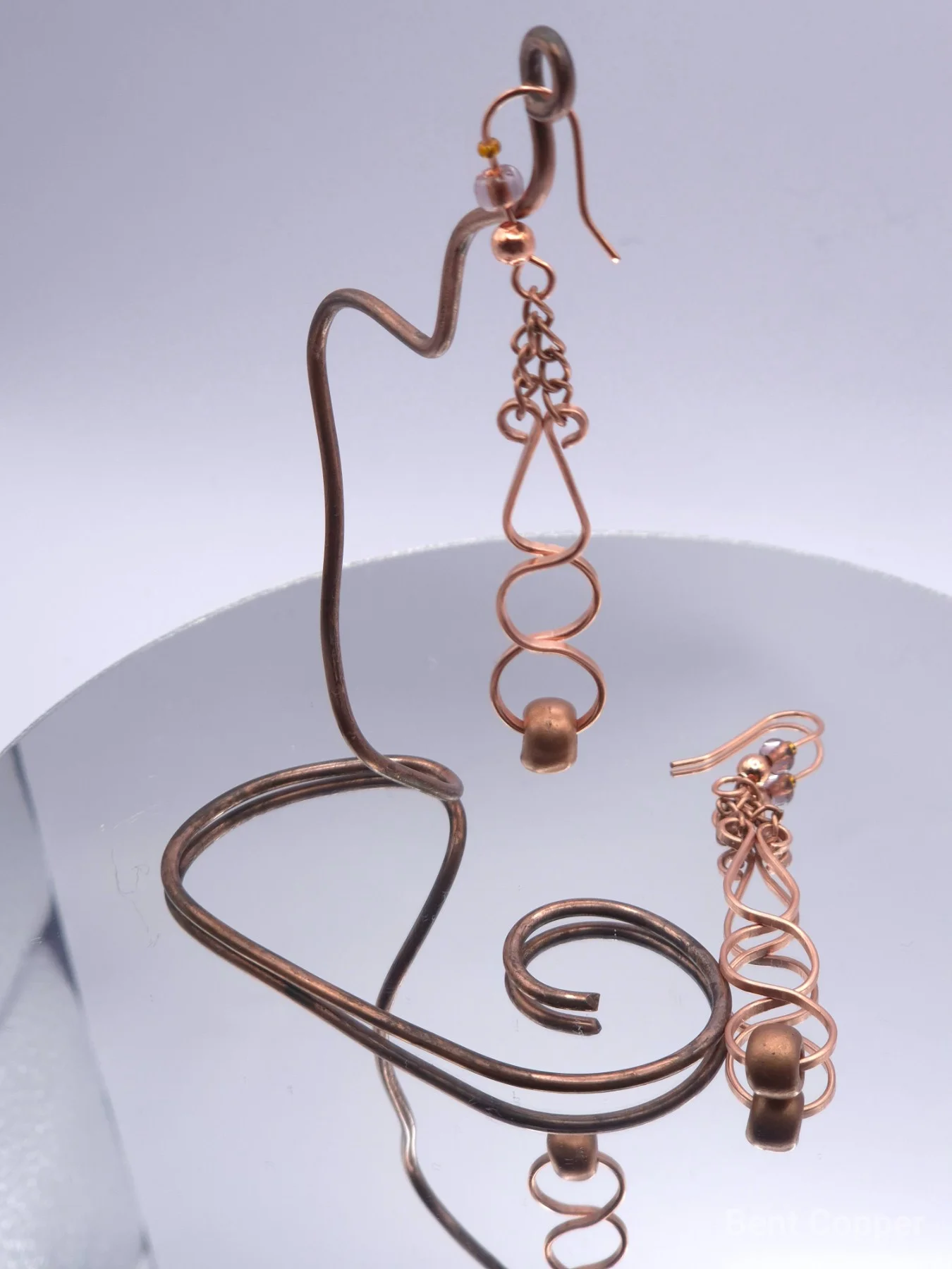 Infinity , handmade copper wire wrapped labradorite earring by Bent Copper